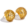 Gold earrings with intricate design on a white background
