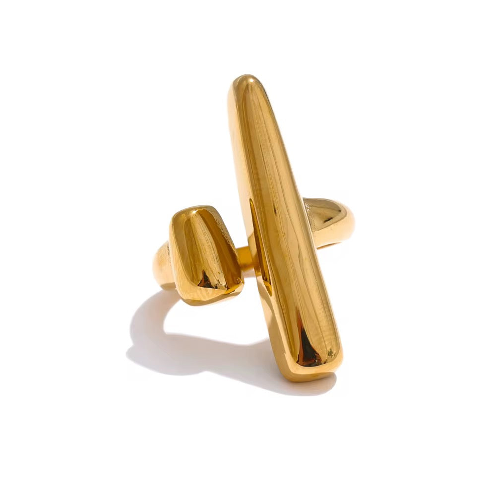 A X I S architectural gold plated statement ring on white background 