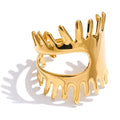 Gold crown-shaped bracelet on a white background