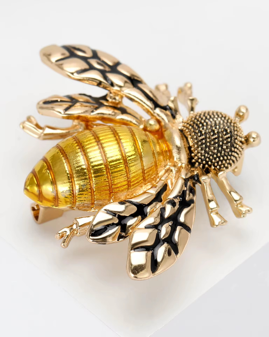 MELISSA gold plated bee brooch white background