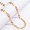 Sayla 18k gold plated luxury waist chain on white background.