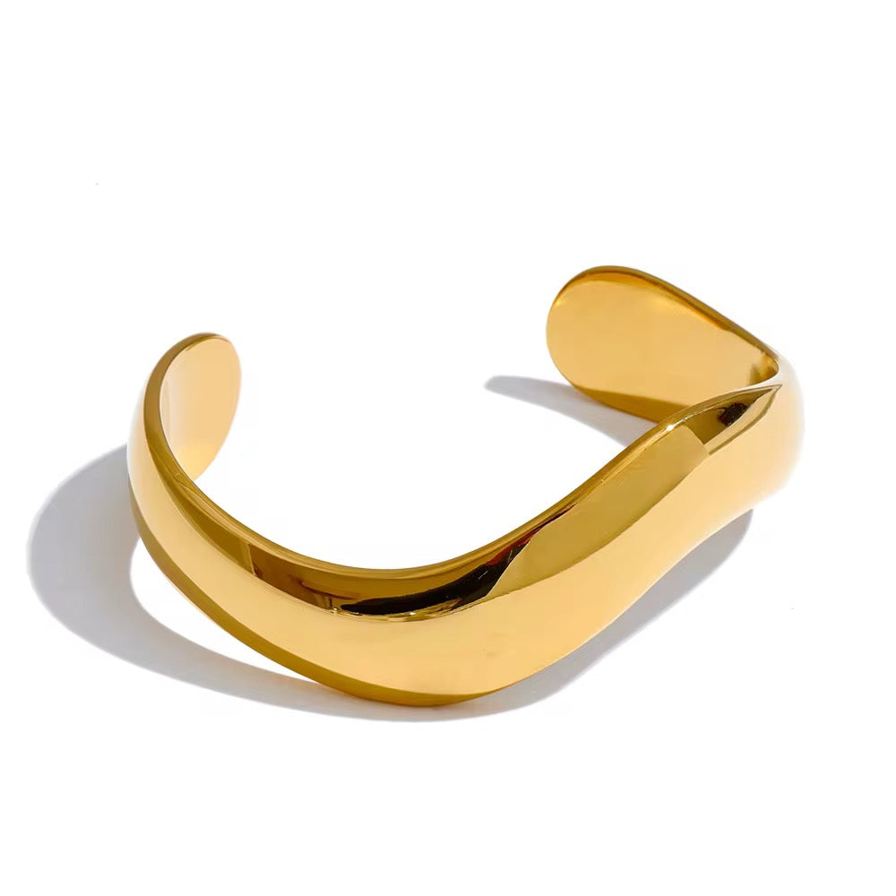 VALE minimalist gold plated cuff bracelet on white background