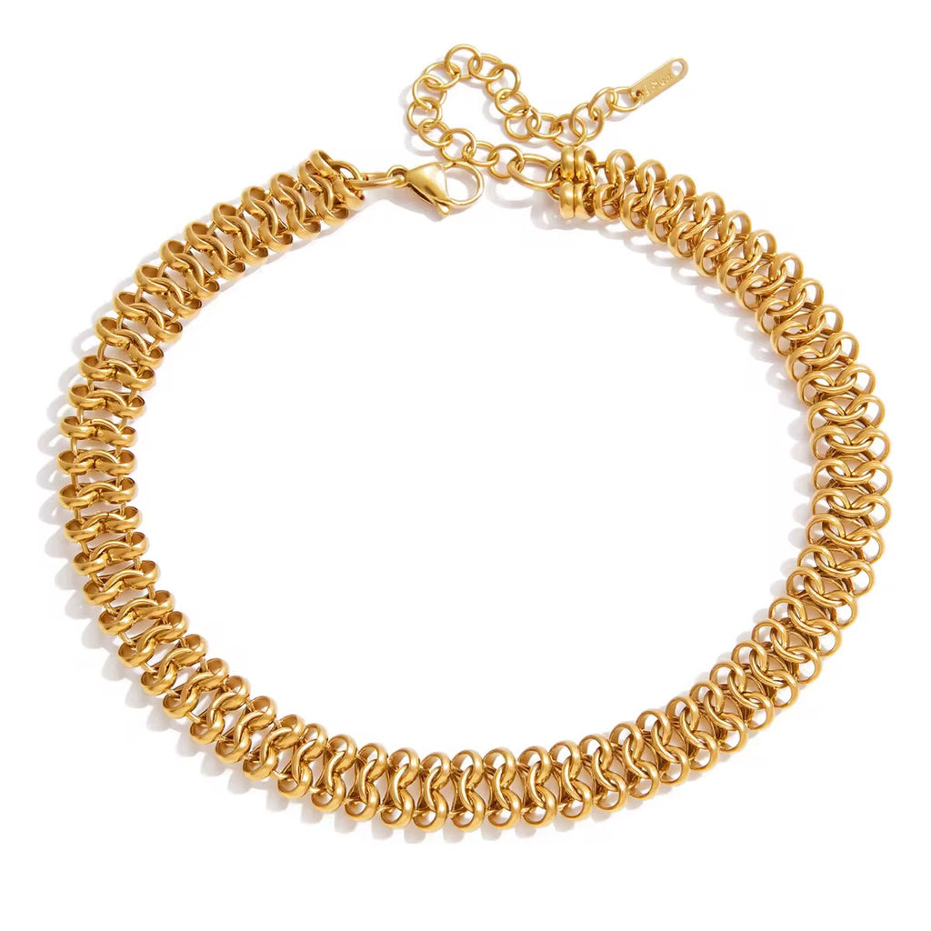 V E R A gold plated sculptural chain necklace on white background
